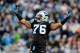 CHARLOTTE, NC - DECEMBER 15: Greg Hardy #76 of the Carolina Panthers tells the fans to cheer against the New York Jets during play at Bank of America Stadium on December 15, 2013 in Charlotte, North Carolina. (Photo by Grant Halverson/Getty Images)