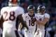 OAKLAND, CA - DECEMBER 29: Peyton Manning #18 of the Denver Broncos is congratulated by Joel Dreessen #81 after Manning threw Demaryius Thomas #88 a five-yard touchdown pass that broke the single season passing yard record during their game against the O