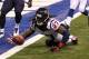 Dec 15, 2013; Indianapolis, IN, USA; Houston Texans defensive back Josh Victorian (27) attempts to keep a punt out of the end zone during the third quarter at Lucas Oil Stadium. The Colts won 25-3. Mandatory Credit: Pat Lovell-USA TODAY Sports
