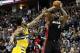 Dec 30, 2013; Denver, CO, USA; Miami Heat small forward LeBron James (6) takes a shot against Denver Nuggets shooting guard Wilson Chandler (21) in the third quarter at the Pepsi Center. The Heat defeated the Nuggets 97-94. Mandatory Credit: Isaiah J. Dow