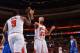 PHILADELPHIA, PA - NOVEMBER 2: Taj Gibson #22 and Luol Deng #9 of the Chicago Bulls high fives against the Philadelphia 76ers at the Wells Fargo Center on November 2, 2013 in Philadelphia, Pennsylvania. NOTE TO USER: User expressly acknowledges and agree