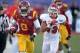 Dec 21, 2013; Las Vegas, NV, USA; Southern California Trojans receiver Marqise Lee (9) is pursued by Fresno State Bulldogs safety Derron Smith (13) on a 40-yard reception in the fourth quarter in the Las Vegas Bowl at Sam Boyd Stadium. USC defeated Fresno