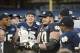 Dec 28, 2013; Bronx, NY, USA; Notre Dame Fighting Irish offensive tackle Zack Martin (70) is awarded the game's MVP trophy against the Rutgers Scarlet Knights in the Pinstripe Bowl at Yankees Stadium. Notre Dame Fighting Irish won the game 29-16. Mandator