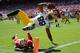 SAN FRANCISCO, CA - SEPTEMBER 08: Jermichael Finley #88 of the Green Bay Packers scores on a twelve yard pass play diving over the tackle of Donte Whitner #31 of the San Francisco 49ers during the second quarter at Candlestick Park on September 8, 2013