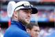 Nov 30, 2013; Gainesville, FL, USA; Florida Gators former player Tim Tebow (15) watches from the sidelines during the first quarter against the Florida State Seminoles at Ben Hill Griffin Stadium. Mandatory Credit: Kim Klement-USA TODAY Sports