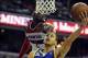 Mar 5, 2012; Washington, DC, USA; Golden State Warriors point guard Stephen Curry (30) shoots a layup against Washington Wizards guard John Wall (2) during the second half at the Verizon Center. The Warriors defeated the Wizards 120 - 100. Mandatory Credi
