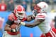 Jan 1, 2014; Jacksonville, FL, USA; Georgia Bulldogs tailback Todd Gurley (3) stiff arms Nebraska Cornhuskers defensive end Jason Ankrah (9) during the first half at EverBank Field . Mandatory Credit: Melina Vastola-USA TODAY Sports