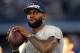 ARLINGTON, TX - SEPTEMBER 08: NBA player Lebron James of the Miami Heat throws a football at AT&T Stadium before a Sunday night game between the New York Giants and the Dallas Cowboys on September 8, 2013 in Arlington, Texas. (Photo by Ronald Martinez/G