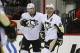 Dec 27, 2013; Raleigh, NC, USA; Pittsburgh Penguins forward James Neal (18) celebrates his overtime winning goal with teammate defensemen Brooks Orpik (44) against the Carolina Hurricanes at PNC Arena. The Pittsburgh Penguins defeated the Carolina Hurrica