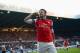 NEWCASTLE UPON TYNE, ENGLAND - DECEMBER 29: Olivier Giroud of Arsenal celebrates scoring the opening goal during the Barclays Premier League match between Newcastle United and Arsenal at St James' Park on December 29, 2013 in Newcastle upon Tyne, England
