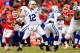 KANSAS CITY, MO - DECEMBER 22: Quarterback Andrew Luck #12 of the Indianapolis Colts passes during the game against the Kansas City Chiefs at Arrowhead Stadium on December 22, 2013 in Kansas City, Missouri. (Photo by Jamie Squire/Getty Images)