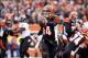 Dec 29, 2013; Cincinnati, OH, USA; Cincinnati Bengals quarterback Andy Dalton (14) runs the ball for a touchdown against the Baltimore Ravens in the fourth quarter at Paul Brown Stadium. Cincinnati defeated Baltimore 34-17. Mandatory Credit: Mark Zerof-US