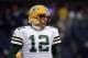 Dec 29, 2013; Chicago, IL, USA; Green Bay Packers quarterback Aaron Rodgers (12) takes the field before the game against the Chicago Bears at Soldier Field. Mandatory Credit: Mike DiNovo-USA TODAY Sports