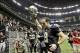 Dec 29, 2013; New Orleans, LA, USA; New Orleans Saints quarterback Drew Brees (9) holds his helmet up to fans as he leaves the field at the Mercedes-Benz Superdome. New Orleans defeated the Tampa Bay Buccaneers 42-17. Mandatory Credit: Crystal LoGiudice-U