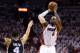 MIAMI, FL - JUNE 20: LeBron James #6 of the Miami Heat makes a three-pointer over Danny Green #4 of the San Antonio Spurs in the second quarter during Game Seven of the 2013 NBA Finals at AmericanAirlines Arena on June 20, 2013 in Miami, Florida. NOTE TO