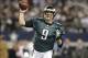 Dec 29, 2013; Arlington, TX, USA; Philadelphia Eagles quarterback Nick Foles (9) throws a pass in the fourth quarter against the Dallas Cowboys at AT&T Stadium. The Eagle beat the Cowboys 24-22. Mandatory Credit: Tim Heitman-USA TODAY Sports