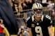 Dec 29, 2013; New Orleans, LA, USA; New Orleans Saints quarterback Drew Brees (9) celebrates a touchdown run against the Tampa Bay Buccaneers during the fourth quarter of a game at the Mercedes-Benz Superdome.The Saints defeated the Buccaneers 42-17. Mand