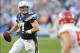 Dec 29, 2013; San Diego, CA, USA; San Diego Chargers quarterback Philip Rivers (17) rolls out of the pocket in overtime against the Kansas City Chiefs at Qualcomm Stadium. The Chargers won 27-24 in overtime. Mandatory Credit: Christopher Hanewinckel-USA T