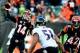 Dec 29, 2013; Cincinnati, OH, USA; Cincinnati Bengals quarterback Andy Dalton (14) throws the ball during the fourth quarter against the Baltimore Ravens at Paul Brown Stadium. The Bengals won 34-17. Mandatory Credit: Andrew Weber-USA TODAY Sports