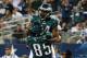 ARLINGTON, TX - DECEMBER 29: Bryce Brown #34 celebrates his touchdown with James Casey #85 of the Philadelphia Eagles in the fourth quarter against the Dallas Cowboys at Cowboys Stadium on December 29, 2013 in Arlington, Texas. (Photo by Ronald Martinez