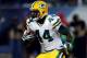 CHICAGO, IL - DECEMBER 29: Running back James Starks #44 of the Green Bay Packers carries the ball against the Chicago Bears during a game at Soldier Field on December 29, 2013 in Chicago, Illinois. (Photo by Jonathan Daniel/Getty Images)