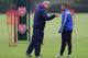 ST ALBANS, ENGLAND - NOVEMBER 25: Arsenal manager Arsene Wenger talks with player Serge Gnabry during a training session at London Colney on November 25, 2013 in St Albans, England. (Photo by Shaun Botterill/Getty Images)