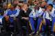 DENVER, CO - APRIL 23: David Lee (2L) of the Golden State Warriors sits on the bench in his street clothes as he is on the injured reserve list against the Denver Nuggets during Game Two of the Western Conference Quarterfinals of the 2013 NBA Playoffs at