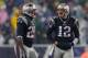 FOXBORO, MA - DECEMBER 29: Tom Brady #12 and LeGarrette Blount #29 of the New England Patriots confer during a game with the Buffalo Bills at Gillette Stadium in the 1st half on December 29, 2013 in Foxboro, Massachusetts. (Photo by Jim Rogash/Getty Image