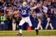 Jan 4, 2014; Indianapolis, IN, USA; Indianapolis Colts quarterback Andrew Luck (12) celebrates after throwing a touchdown pass during the fourth quarter of the 2013 AFC wild card playoff football game against the Kansas City Chiefs at Lucas Oil Stadium. C