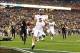 Jan 1, 2014; Glendale, AZ, USA; Central Florida Knights quarterback Blake Bortles runs into the end zone for a fourth quarter touchdown against the Baylor Bears during the Fiesta Bowl at University of Phoenix Stadium. Central Florida defeated Baylor 52-42