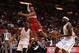 Dec 15, 2012; Miami, FL, USA; Miami Heat shooting guard Dwyane Wade (3) passes the ball past Washington Wizards shooting guard Bradley Beal (3) to small forward LeBron James (6) for a basket in the second half at the American Airlines Arena. The Heat won