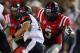 Sep 7, 2013; Oxford, MS, USA; Mississippi Rebels defensive end Robert Nkemdiche (5) goes in for the tackle on Southeast Missouri State Redhawks quarterback Scott Lathrop (17) during the second half at Vaught-Hemingway Stadium. Mandatory Credit: Spruce Der