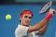 BRISBANE, AUSTRALIA - JANUARY 05: Roger Federer of Switzerland plays a backhand in his mens final match against Lleyton Hewitt of Australia during day eight of the 2014 Brisbane International at Queensland Tennis Centre on January 5, 2014 in Brisbane, Au