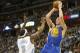 Dec 23, 2013; Denver, CO, USA; Golden State Warriors guard Klay Thompson (11) shoots the ball over Denver Nuggets guard Ty Lawson (3) during the second half at Pepsi Center. The Warriors won 89-81. Mandatory Credit: Chris Humphreys-USA TODAY Sports