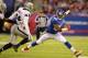 EAST RUTHERFORD, NJ - NOVEMBER 10: Hakeem Nicks #88 of the New York Giants runs after a catch against Kevin Burnett #94 of the Oakland Raiders during their game at MetLife Stadium on November 10, 2013 in East Rutherford, New Jersey. (Photo by Al Bell