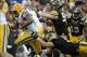 Jan 1, 2014; Tampa, Fl, USA; LSU Tigers running back Jeremy Hill (33) runs past Iowa Hawkeyes defensive lineman Louis Trinca-Pasat (90) during the second half at Raymond James Stadium. LSU Tigers defeated the Iowa Hawkeyes 21-14. Mandatory Credit: Kim Kl