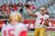 Dec 29, 2013; Phoenix, AZ, USA; San Francisco 49ers quarterback Colin Kaepernick (7) throws to wide receiver Michael Crabtree (15) prior to the game against the Arizona Cardinals at University of Phoenix Stadium. Mandatory Credit: Matt Kartozian-USA TODAY