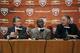 AUSTIN, TX - JANUARY 6: University of Texas president Bill Powers, left and athletic director Steve Patterson, right, introduce new Longhorns head football coach Charlie Strong from Louisville during a press conference January 6, 2014 at Darrell K. Royal