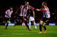 SUNDERLAND, ENGLAND - JANUARY 07: Fabio Borini of Sunderland (C) celebrates with Sebastian Larsson (R) as he scores their second goal from the penalty spot during the Capital One Cup Semi-Final, first leg match between Sunderland and Manchester United at