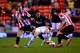 SUNDERLAND, ENGLAND - JANUARY 07: Adnan Januzaj of Manchester United takes on Sebastian Larsson (L) and Phil Bardsley of Sunderland during the Capital One Cup Semi-Final, first leg match between Sunderland and Manchester United at Stadium of Light on Jan