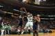 BOSTON, MA - JANUARY 4: Rajon Rondo #9 of the Boston Celtics shoots against Lance Stephenson #1 and David West #21 of the Indiana Pacers on January 4, 2013 at the TD Garden in Boston, Massachusetts. NOTE TO USER: User expressly acknowledges and agrees t