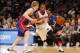 Jan 7, 2014; New York, NY, USA; New York Knicks shooting guard J.R. Smith (8) dribbles the ball around Detroit Pistons small forward Kyle Singler (25) during the second half at Madison Square Garden. The Knicks won 89-85. Mandatory Credit: Jim O'Connor-U