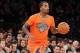 Dec 25, 2013; New York, NY, USA; New York Knicks shooting guard J.R. Smith (8) controls the ball during the third quarter of a game against the New York Knicks at Madison Square Garden. The Thunder defeated the Knicks 123-94. Mandatory Credit: Brad Penner