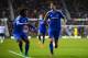 DERBY, ENGLAND - JANUARY 05: Willian of Chelsea (L) congratulates Oscar of Chelsea on scoring their second goal during the Budweiser FA Cup Third Round match between Derby County and Chelsea at iPro Stadium on January 5, 2014 in Derby, England. (Photo b