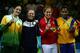 RIO DE JANEIRO, BRAZIL - JULY 20: (L-R) Mayra Silva of Brazil (silver), Ronda Rousey of the United States of America (gold), Catherine Roberge (bronze), Yuri Alver Colombia (bronze) pose with medals after the Women's 70Kg Judo final in the 2007 XV Pan Am