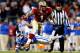 CHARLOTTE, NC - DECEMBER 07: Wide receiver Kelvin Benjamin #1 of the Florida State Seminoles runs with the ball as cornerback Deondre Singleton #33 of the Duke Blue Devils defends during the ACC Championship game at Bank of America Stadium on December 7,