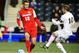 Dec 13, 2013; Chester, PA, USA; New Mexico Lobos defenseman Kyle Venter (12) passes the ball past Notre Dame Fighting Irish forward Harrison Shipp (10) at PPL Park. Mandatory Credit: Evan Habeeb-USA TODAY Sports