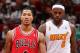 MIAMI, FL - OCTOBER 29: Derrick Rose #1 of the Chicago Bulls walks up the court against LeBron James #6 of the Miami Heat on October 29, 2013 at AmericanAirlines Arena in Miami, Florida. NOTE TO USER: User expressly acknowledges and agrees that, by downl