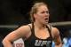 Dec 28, 2013; Las Vegas, NV, USA; Ronda Rousey in the cage after defeating Miesha Tate (not pictured) in their UFC Women's Bantamweight Championship Bout at the MGM Grand Garden Arena. Rousey won with an arm bar in the third round. Mandatory Credit: Ja