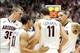 Dec 11, 2013; Tucson, AZ, USA; Arizona Wildcats center Kaleb Tarczewski (35) and guard Nick Johnson (13) and forward Aaron Gordon (11) and forward Brandon Ashley (21) huddle during the second half against the New Mexico State Aggies at McKale Center. Mand